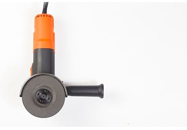Close-up of angle grinder in action